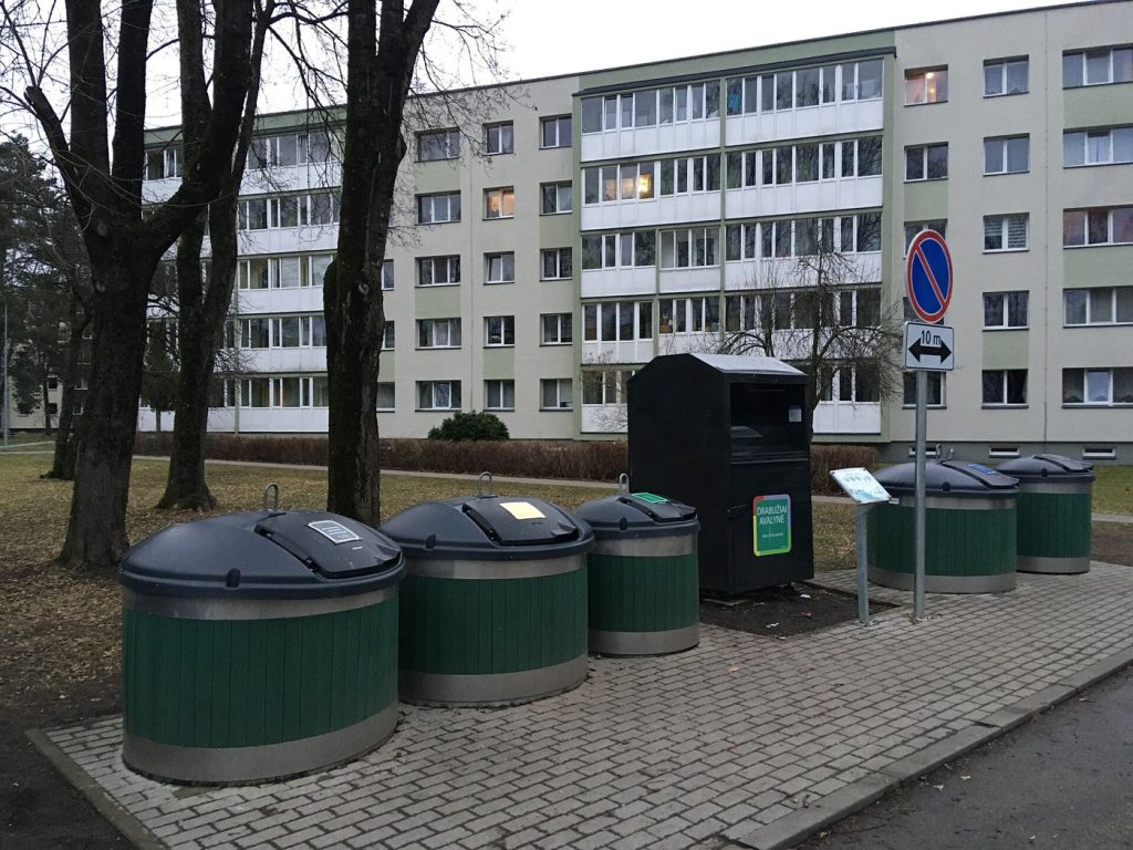 recycling bins lined along a residential street